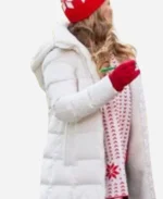 Tammin Sursok Trivia at St. Nick’s 2024 White Puffer Coat