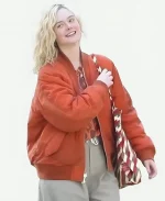 Margo Millet Margo’s Got Money Troubles 2026 Elle Fanning Orange Bomber Jacket