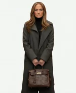 Jennifer Lopez Movies Office Romance 2026 Jackie Cruz Black Trench Coat