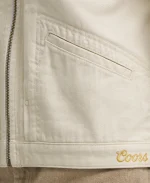 Detailed close-up of waist pocket stitch detail and yellow embroidered Coors script logo on bottom hem.