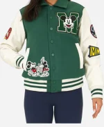 Front view of Disney Adult Unisex varsity jacket in green featuring Mickey Mouse patches, snap button closure, rib knitted hem and sleeves.