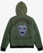 Close-up rear detail of the Marvel Doctor Doom Army Hooded Varsity Jacket featuring embroidered Doctor Doom mask, Doomstadt text, and Latveria lettering.
