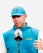 NFL Team Liam Coen Jacksonville Jaguars Head Coach Teal Blue Hooded Vest 